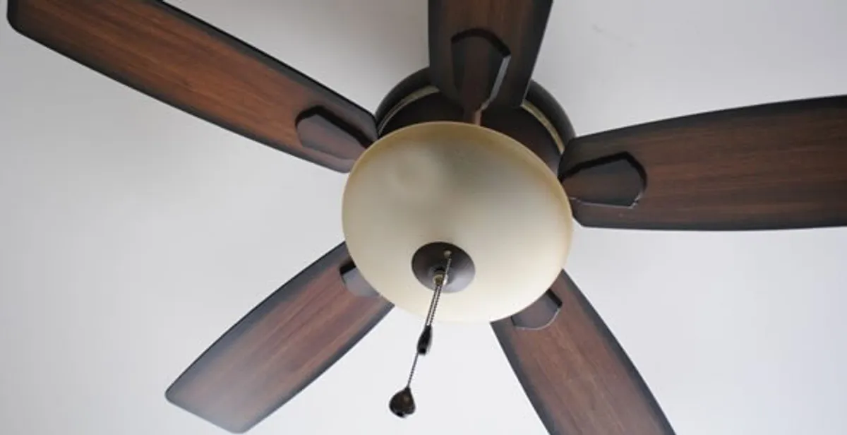 Fully installed ceiling fan with balanced blades and light fixture in Minneapolis, MN