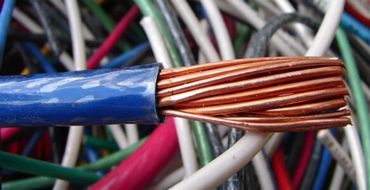 electrical wiring services showing exposed copper conductors and cable preparation in Minneapolis, MN