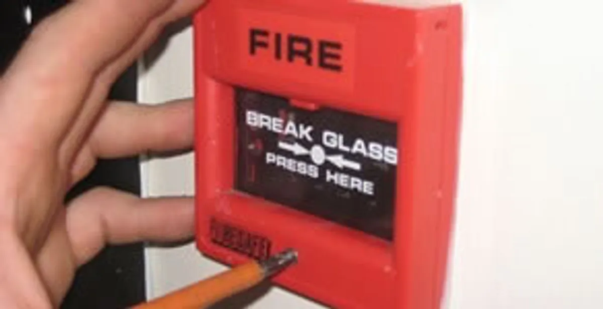 fire alarm installation service showing manual fire alarm pull station installed by licensed electricians in Minneapolis, MN